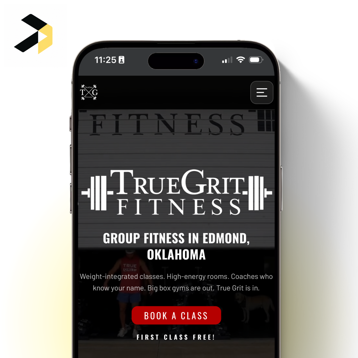 True Grit Fitness mobile website showing its group fitness message, Book a Class button, and first class free offer